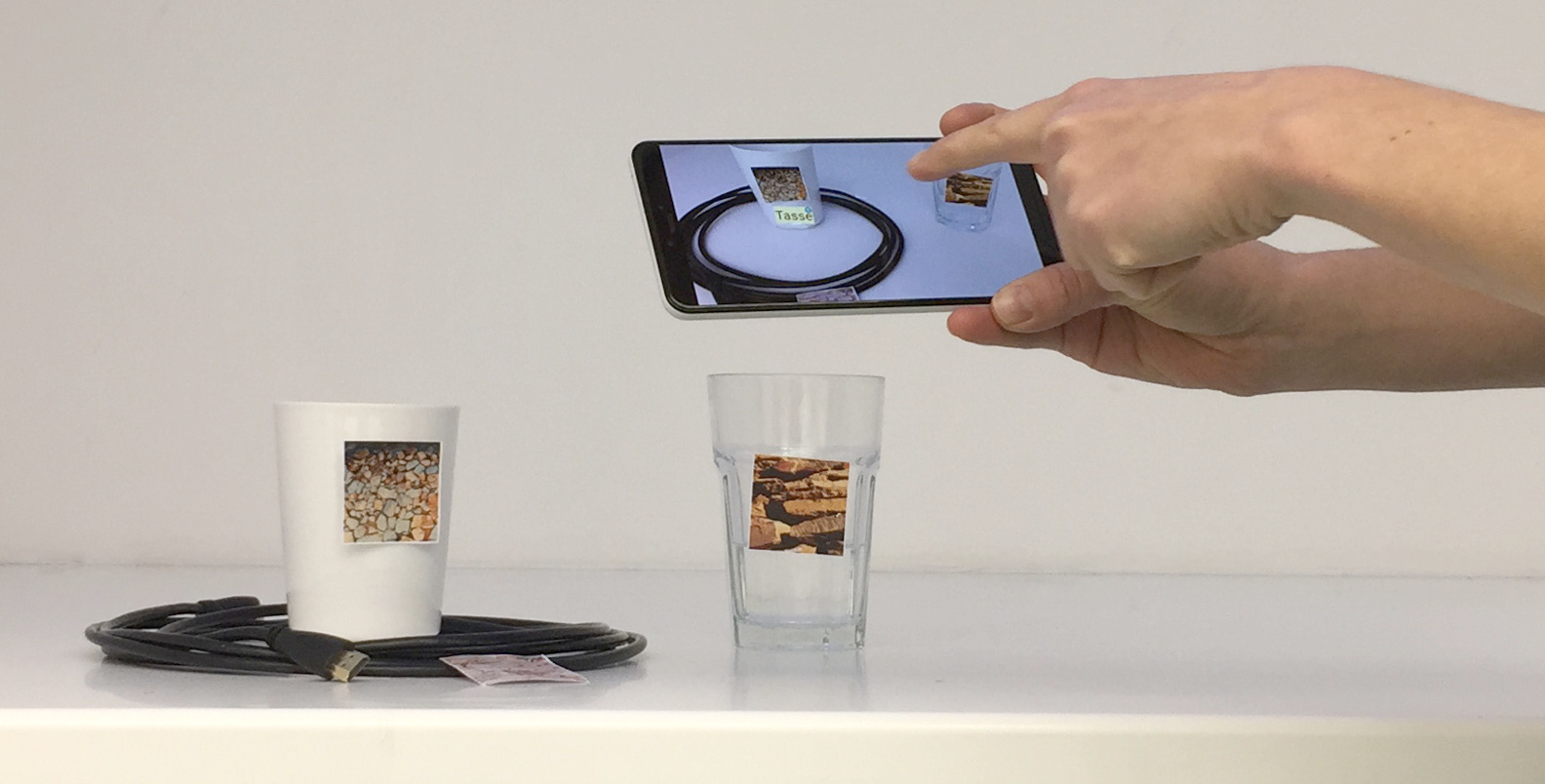 Augmented Reality to Enable Users in Learning Case Grammar from Their Real-World Interactions